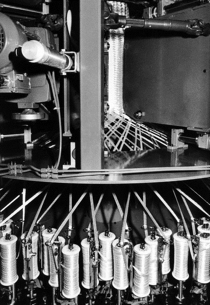Old sewing machine for glass fiber tubes
